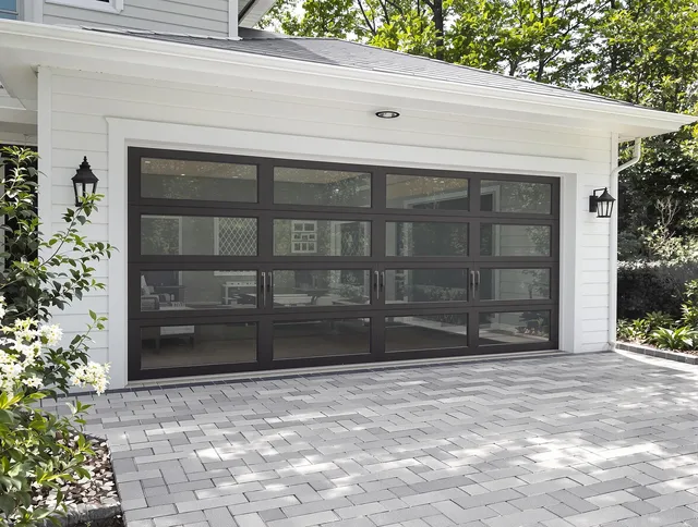 Lakeville Garage Door Repair design specialist presenting custom garage door options to Lakeville homeowner
