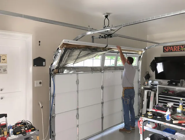 Garage door section replacement by Lakeville Garage Door Repair in Lakeville