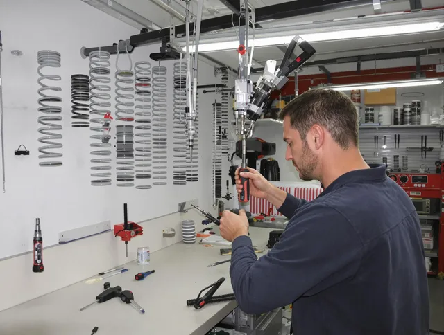 Lakeville Garage Door Repair safety certified technician performing precision spring replacement in Lakeville