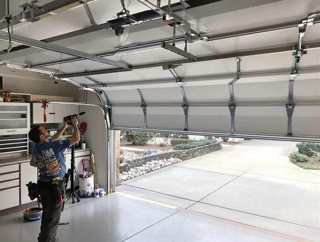 Garage door track repair service by Lakeville Garage Door Repair in Lakeville